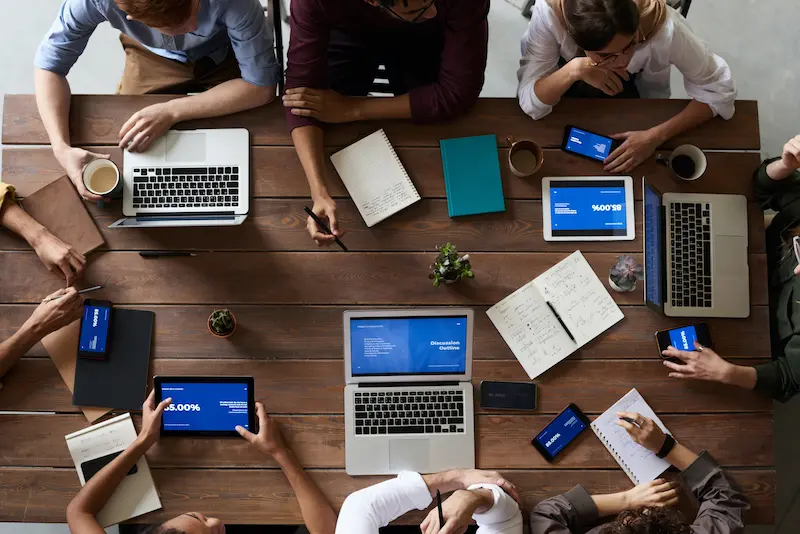 Top view of a group working on a table